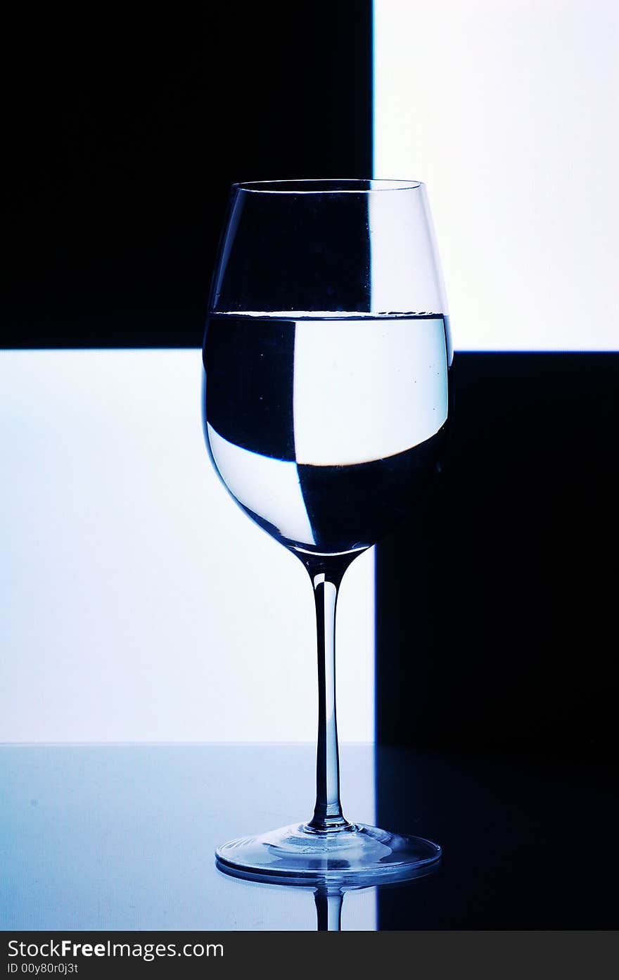 Glass with water with background