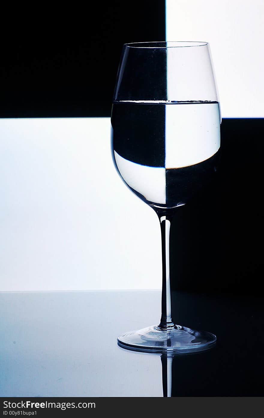 Glass with water with background