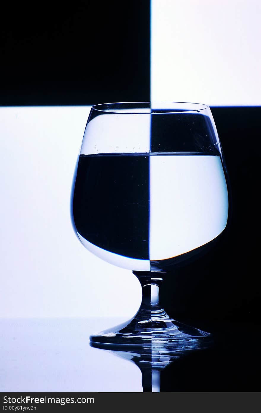 Glass with water with background