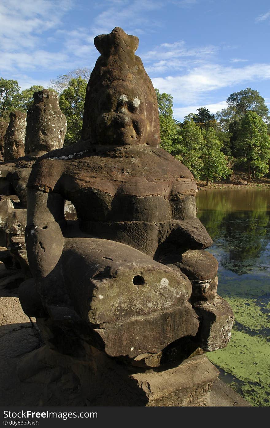 Statues on the bridge to the Victory Gate entrance into Angkor Thom,one of the entrane into Angkor Thom. Statues on the bridge to the Victory Gate entrance into Angkor Thom,one of the entrane into Angkor Thom