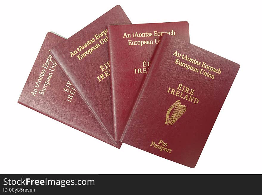 Four European Passports isolated on a white background