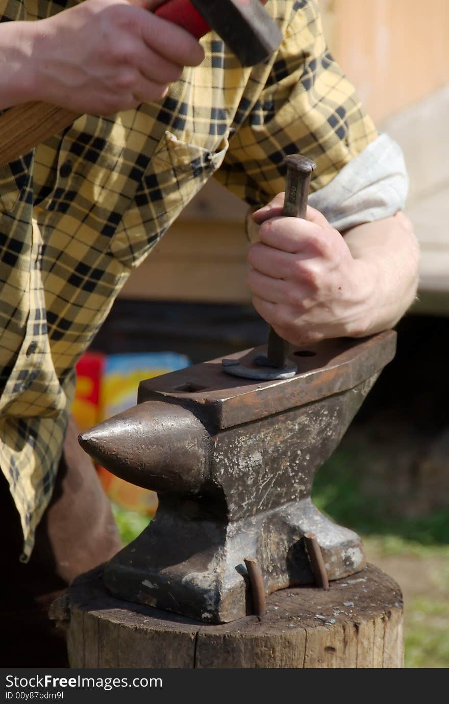 Blacksmith Making Horseshoes