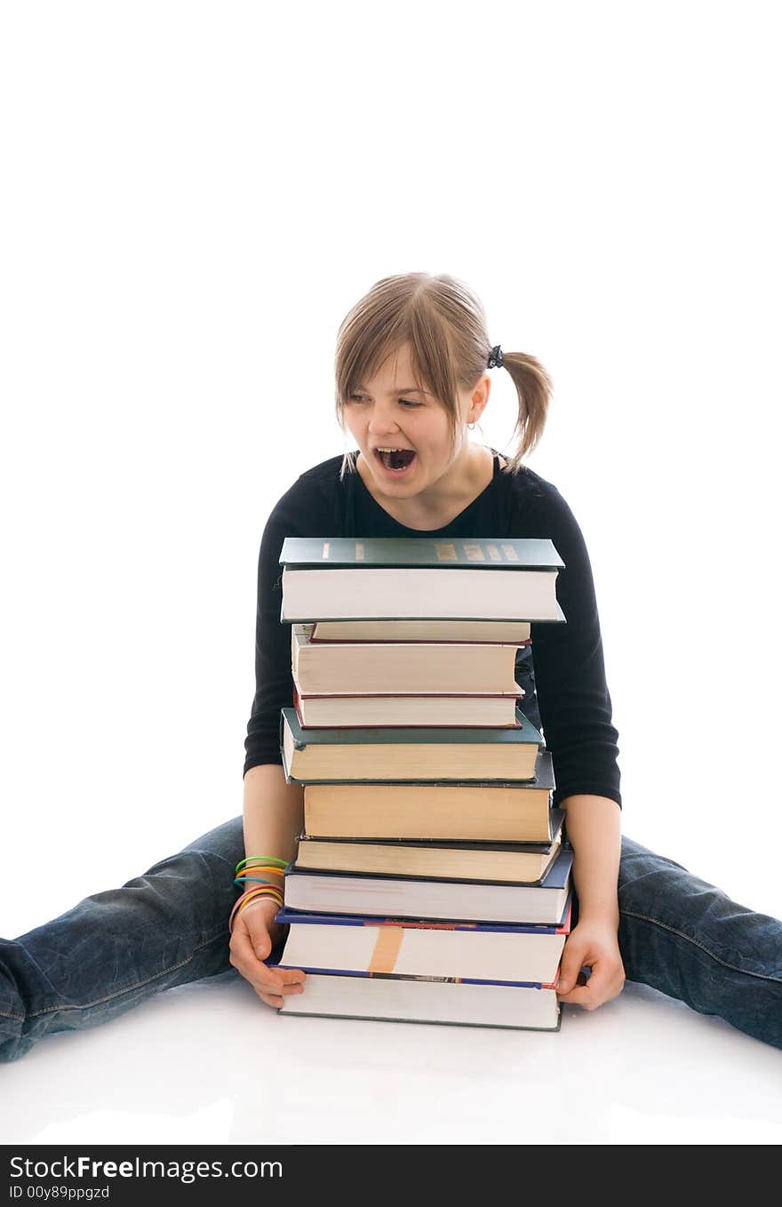 The young student with the books isolated on a white background