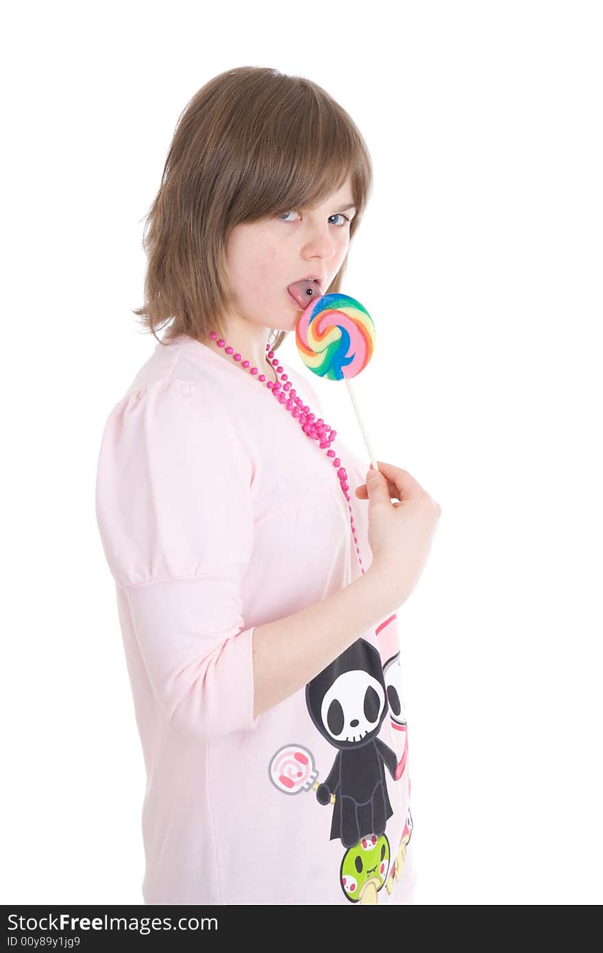 The girl with a sugar candy isolated on a white background