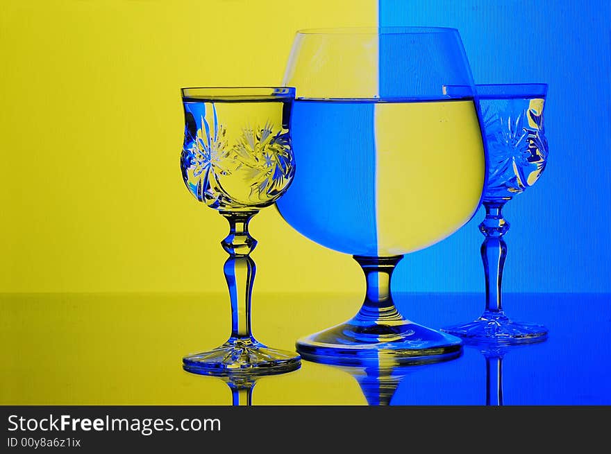 Glasses with water with background