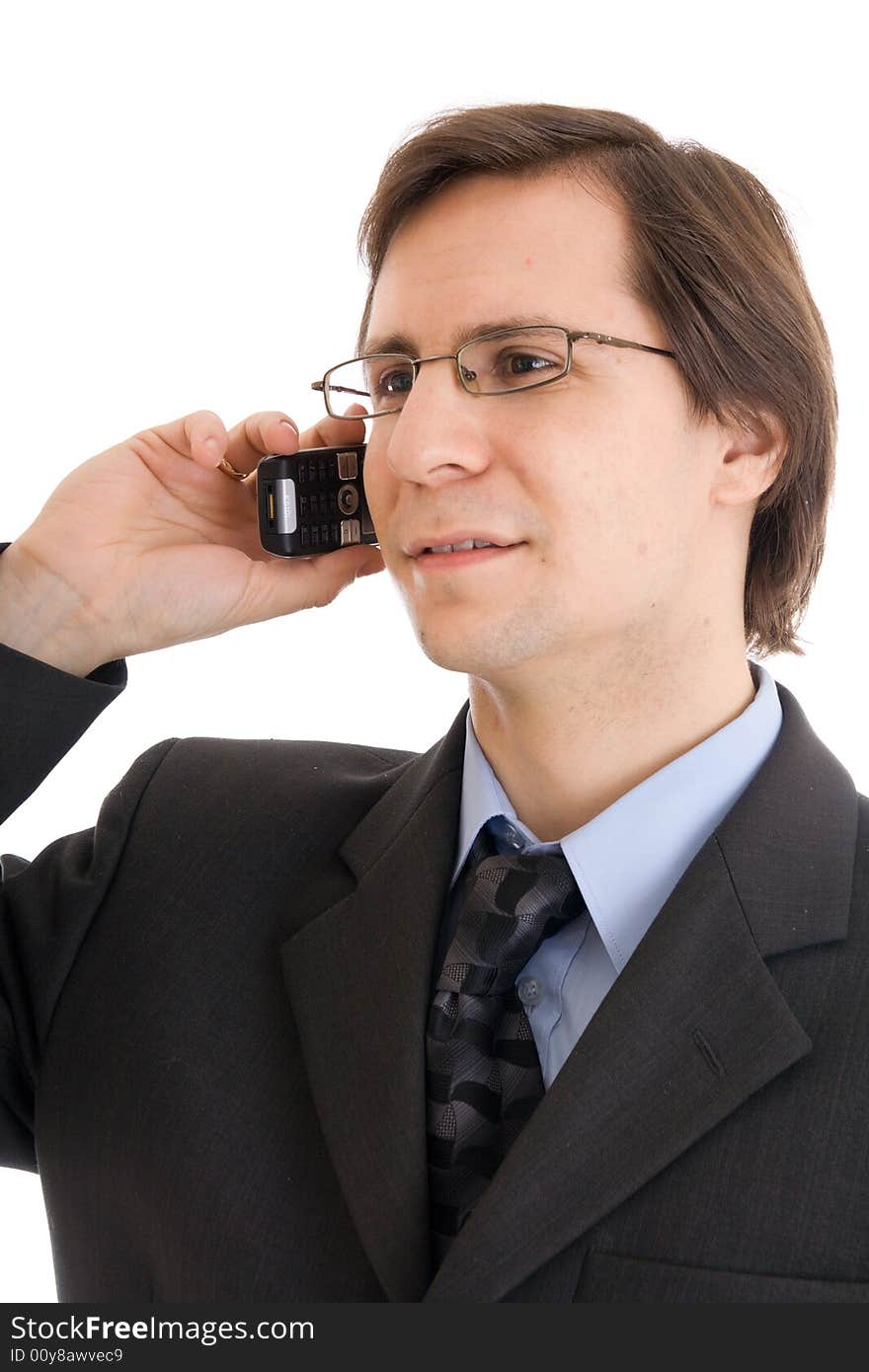 The young businessman talking by phone isolated