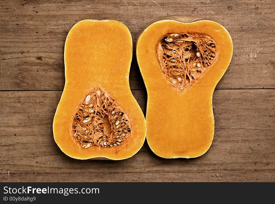 Pumpkins on wooden table. Studio shot.