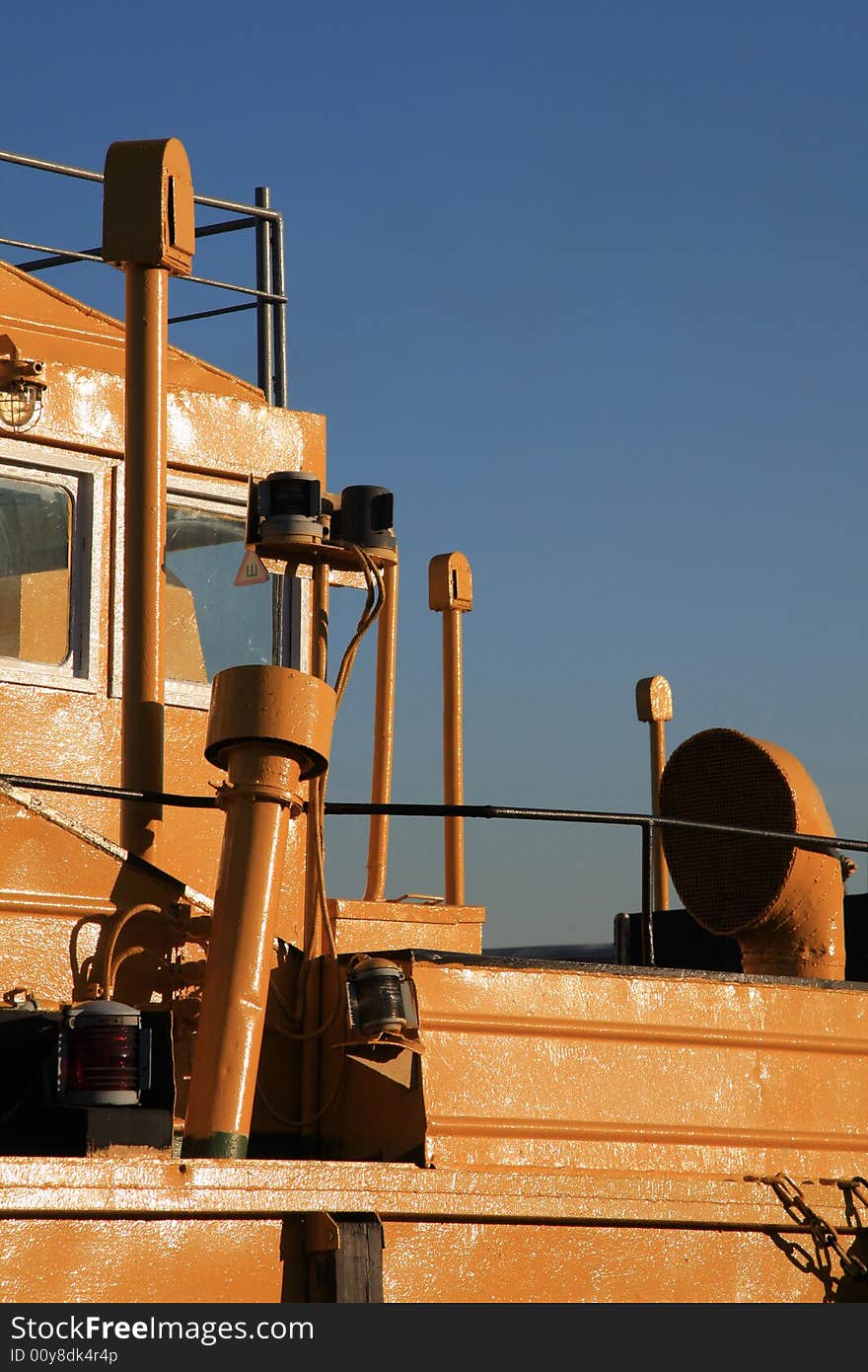 Orange tow in port