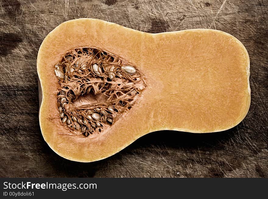 Pumpkin on wooden table.