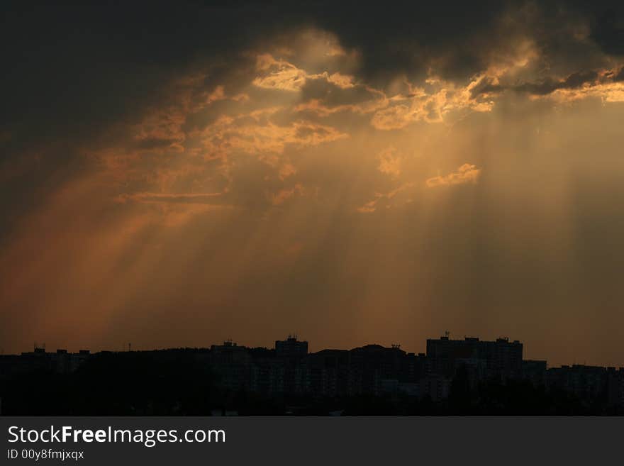 Sun coloring haze through the clouds. Sun coloring haze through the clouds.