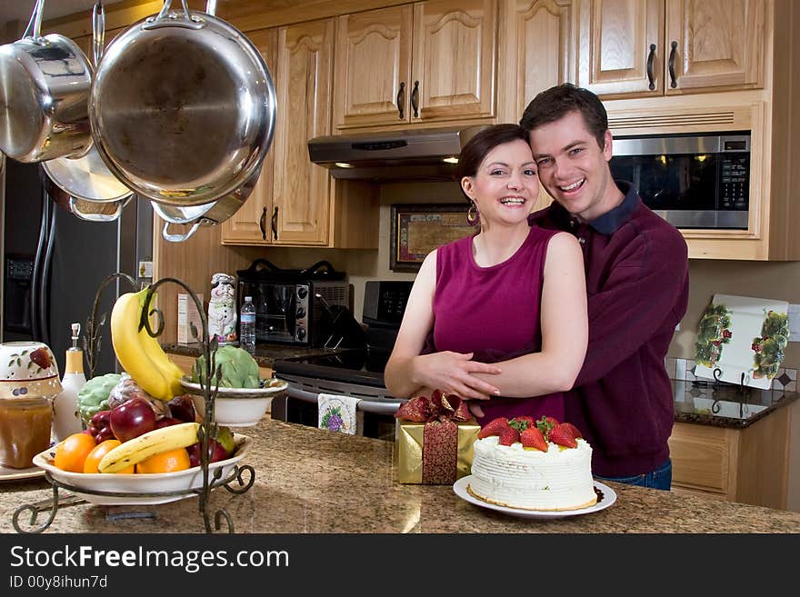 Couple Laughing in the Kitchen - Horizontal