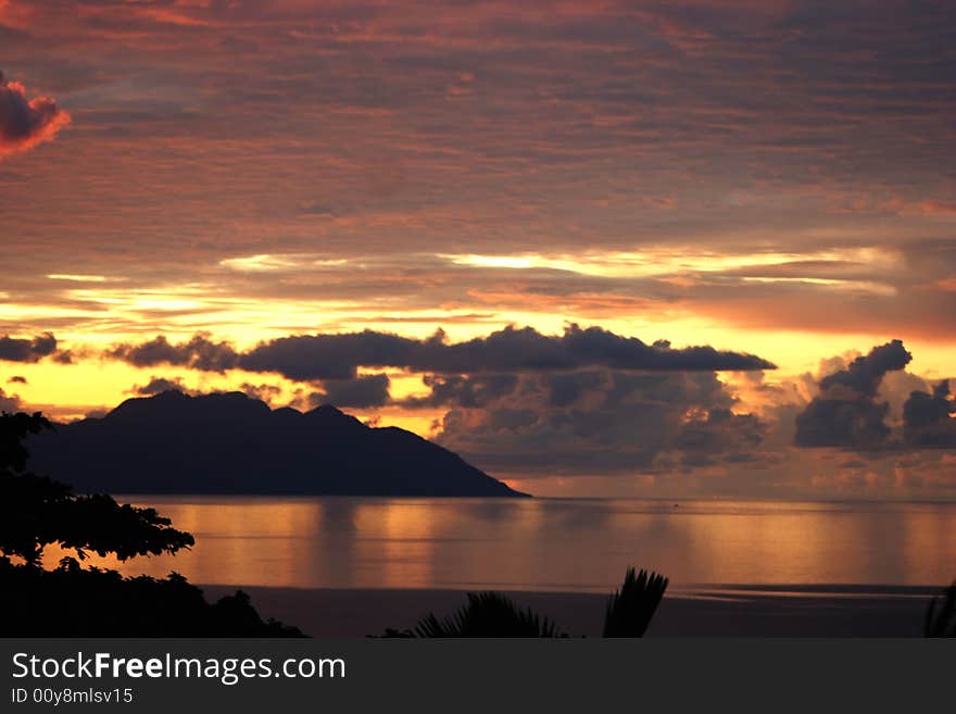 Sunset and  tropical island.