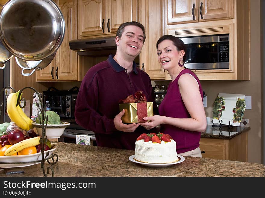 Couple Laughing in the Kitchen - Horizontal