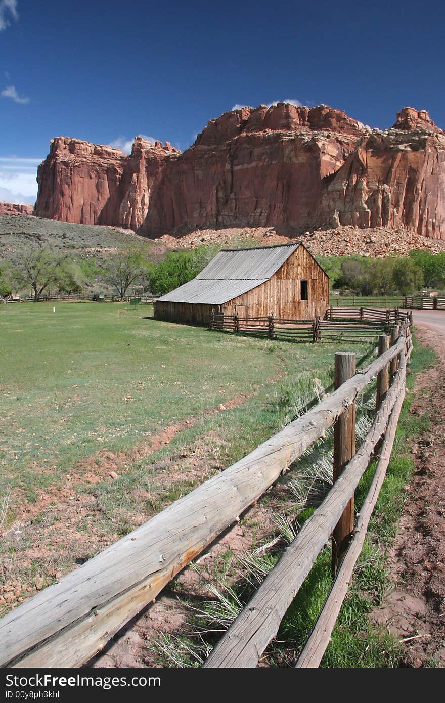 Historic farm in Capitol Reef National Park. Beautiful geologic features in background. Utah. USA