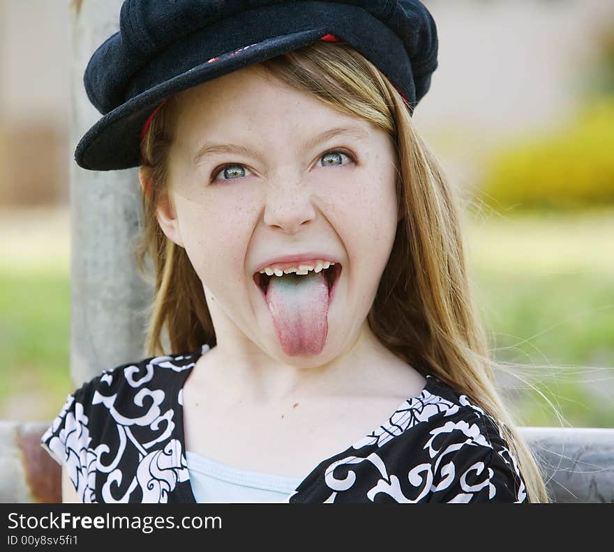 Girl with a stained tongue