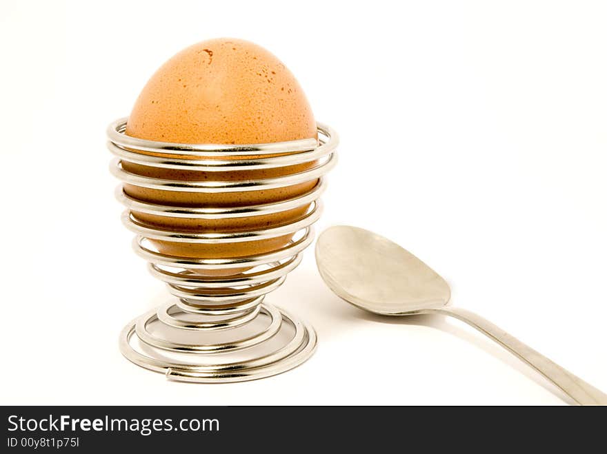 Eggholder with a spoon