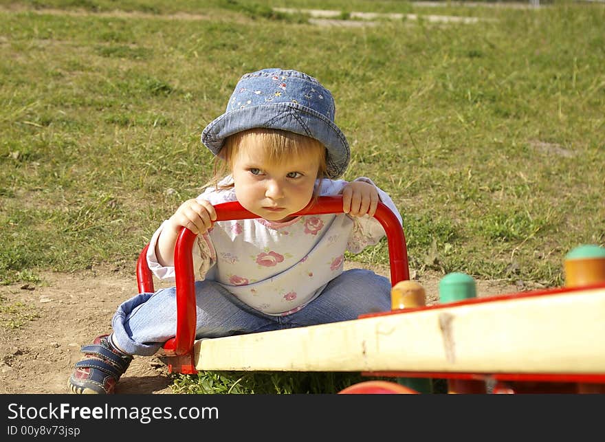 Girl swinging in the park