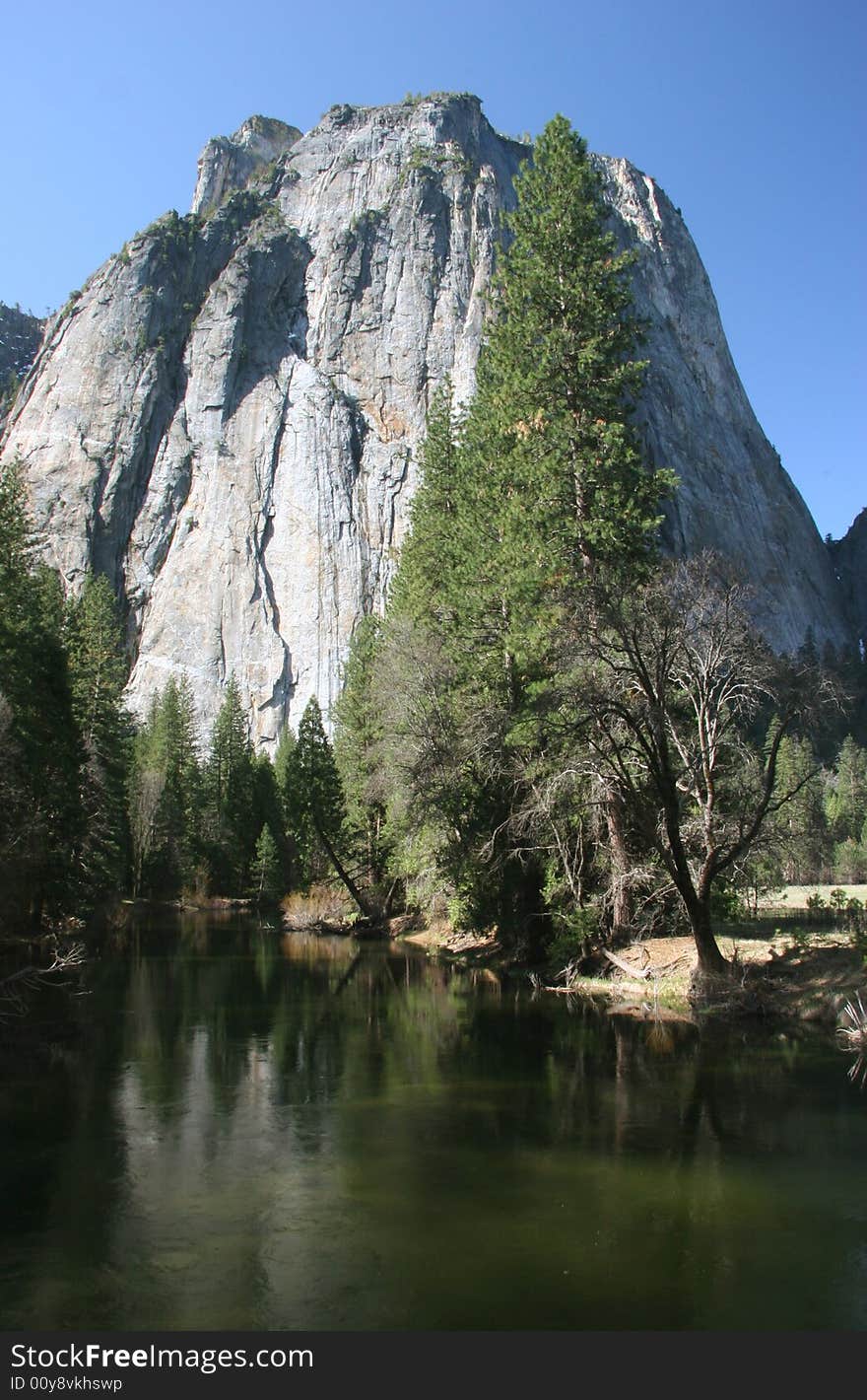 Famous natural landmark destination El Capitan, one of the magnificent mountains in Yosemite. Yosemite national park. California. USA. Famous natural landmark destination El Capitan, one of the magnificent mountains in Yosemite. Yosemite national park. California. USA