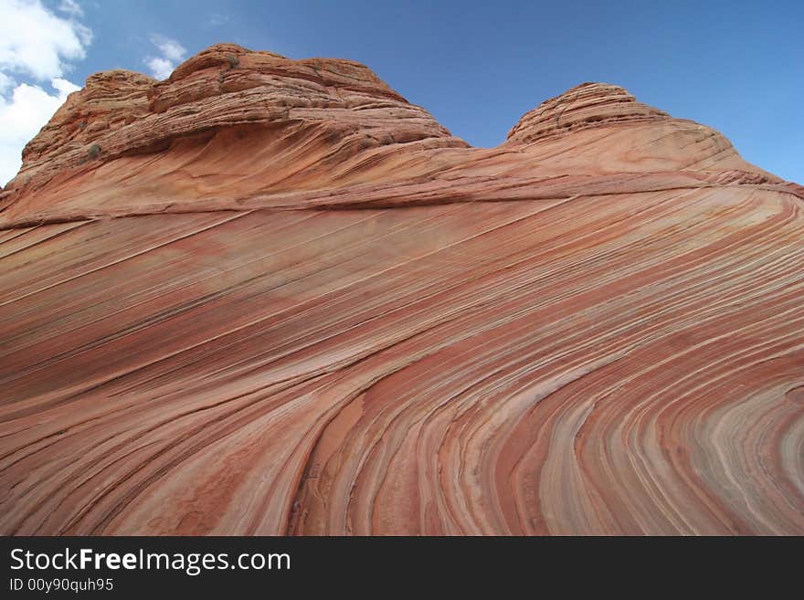 The famous landmark in pastel colors. Geological Feature. Wave. Paria Canyon. Vermillion Cliffs. Utah. USA. The famous landmark in pastel colors. Geological Feature. Wave. Paria Canyon. Vermillion Cliffs. Utah. USA