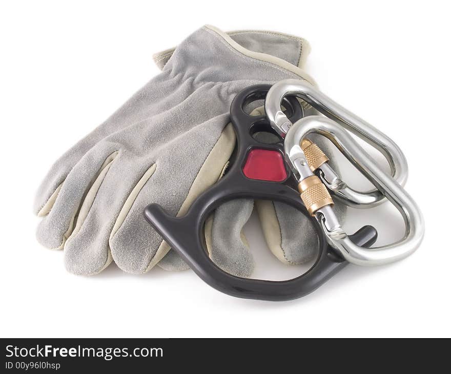 Photo of locking carabiners, glove and rescue eight on white background. Photo of locking carabiners, glove and rescue eight on white background.