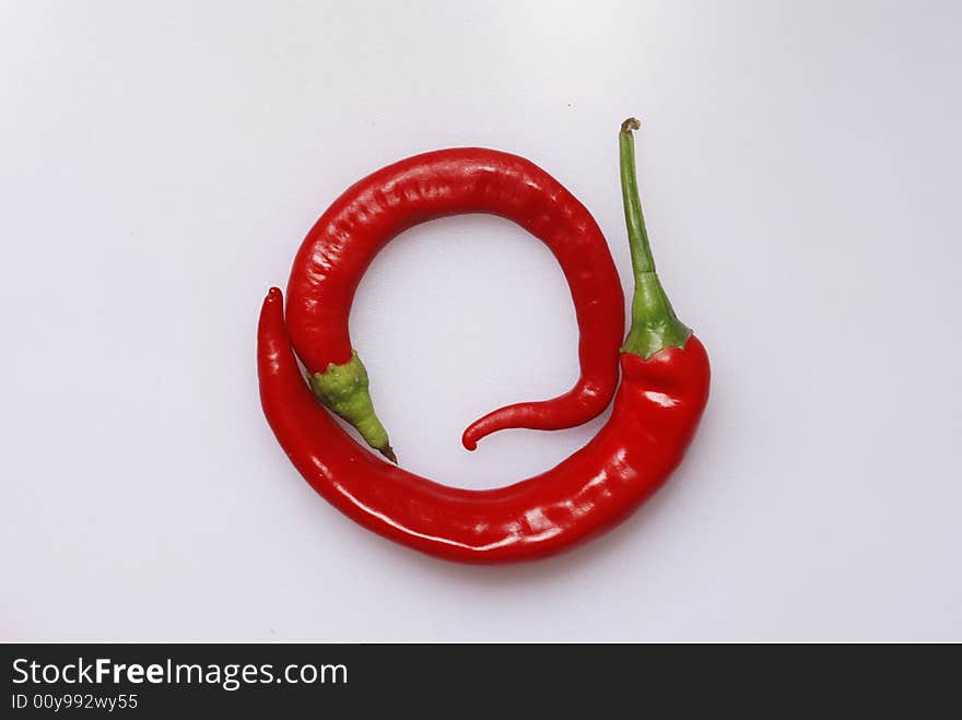 Red Chili Pepper On Bakgraund Wite.