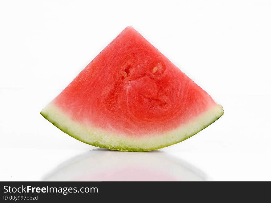 A slice of watermelon in an isolated background. A slice of watermelon in an isolated background