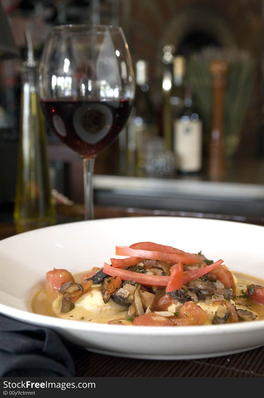 Ravioli with heirloom tomatoes and organic mushrooms. Ravioli with heirloom tomatoes and organic mushrooms