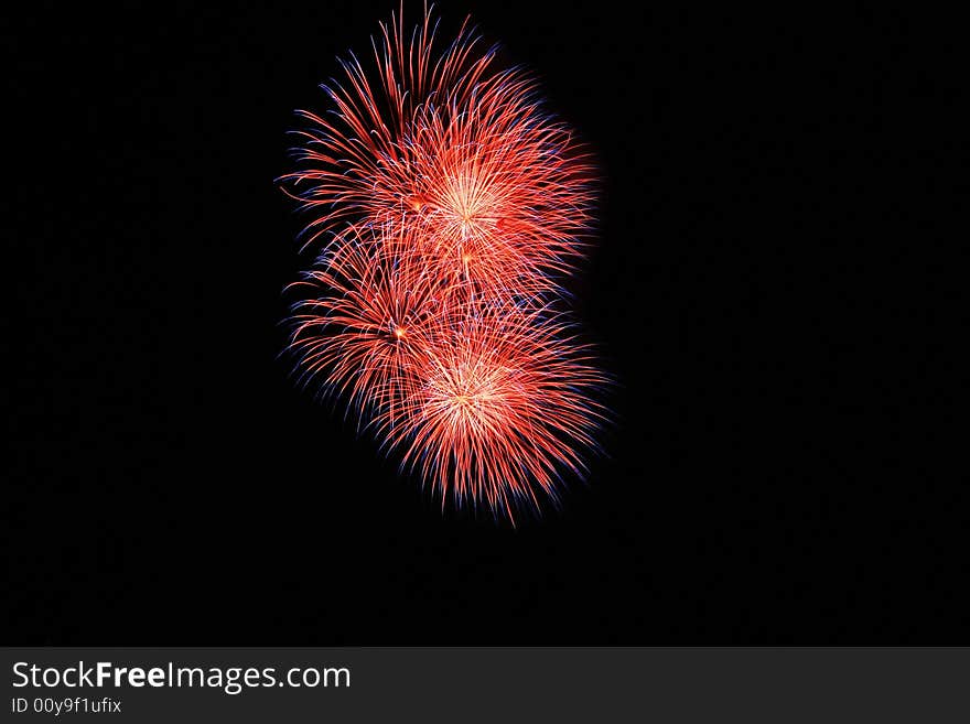 Color changing fireworks against the dark sky