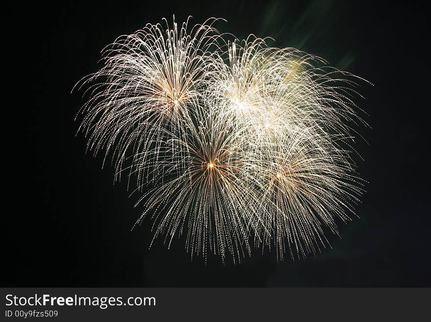 Koosh ball fireworks against the dark sky