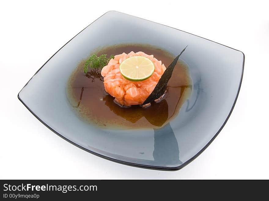 Salmon tartarus with bay leaf and lemon