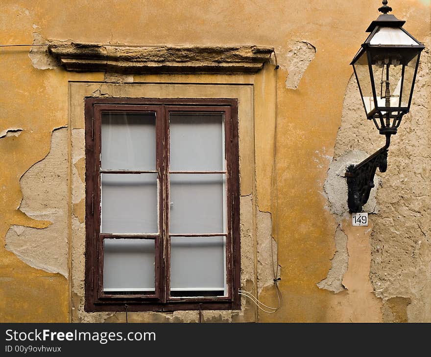 One of Zagreb old town windows with gas-lamp near it. One of Zagreb old town windows with gas-lamp near it.