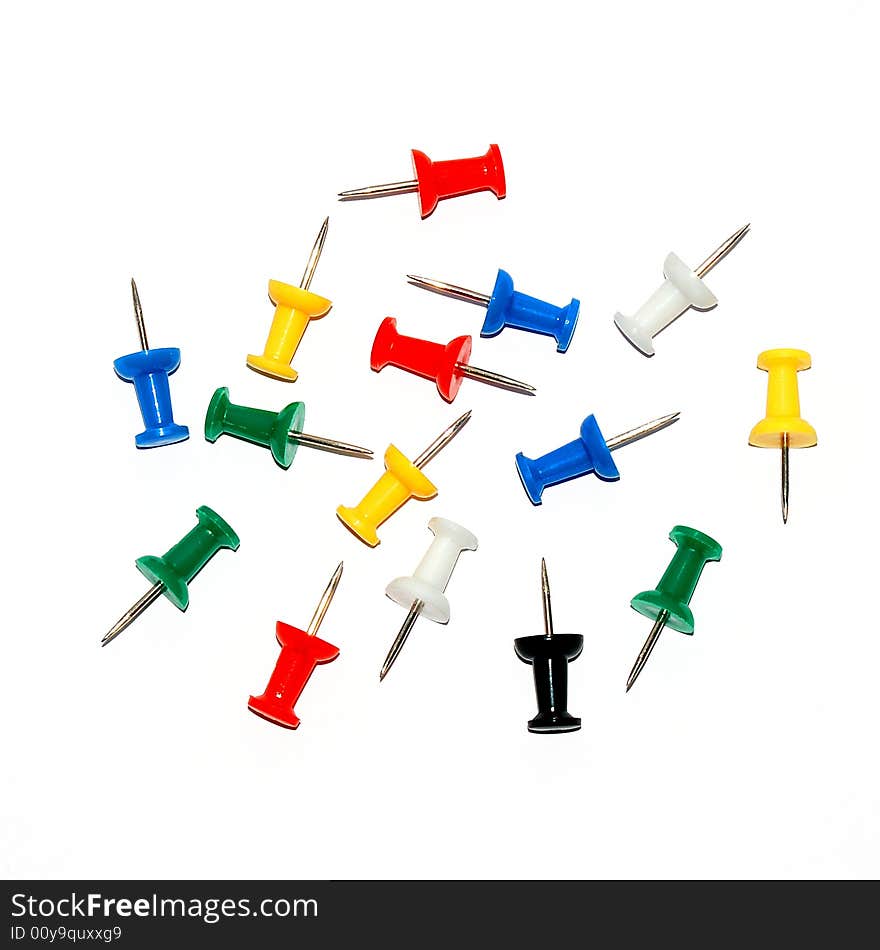 Colour stationary pushpin on the white background