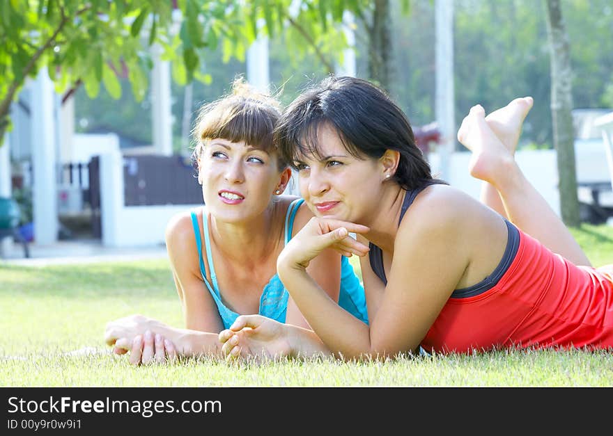 Portrait of two young woman  having fun in summer environment. Portrait of two young woman  having fun in summer environment