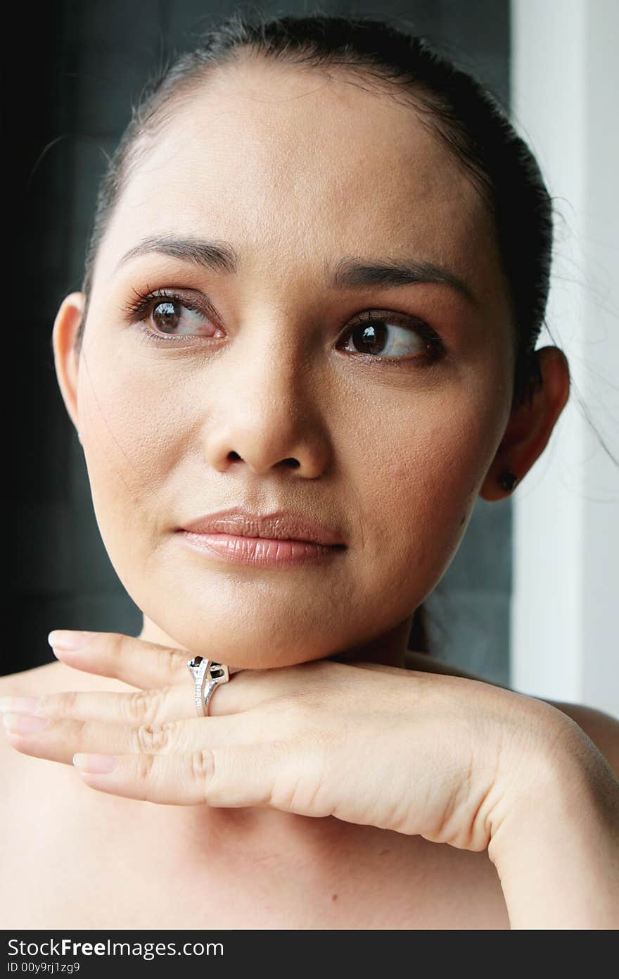 Close-up portrait of a beautiful Thai woman. Close-up portrait of a beautiful Thai woman.