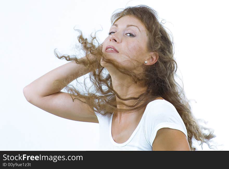 Stylish shot of nice young long hair woman on white back. Stylish shot of nice young long hair woman on white back