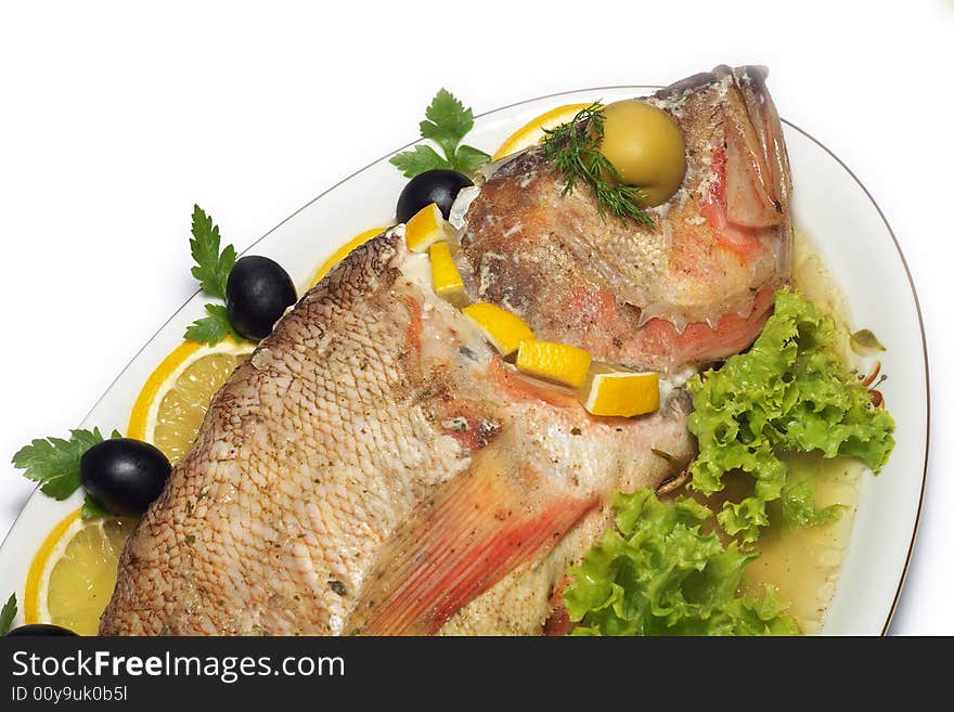 Baked perch fish with salad isolated. Baked perch fish with salad isolated