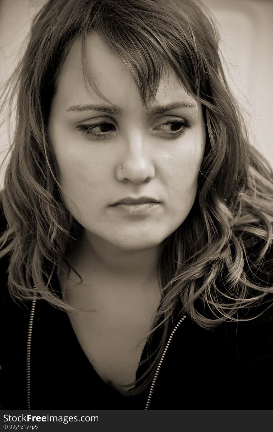 Blond woman close portrait, sepia toned. Blond woman close portrait, sepia toned.