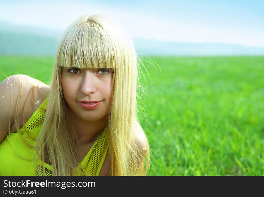 Beauty young woman jump in field