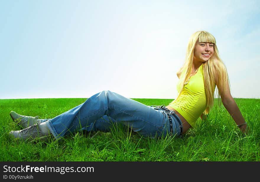 Beauty young woman jump in field