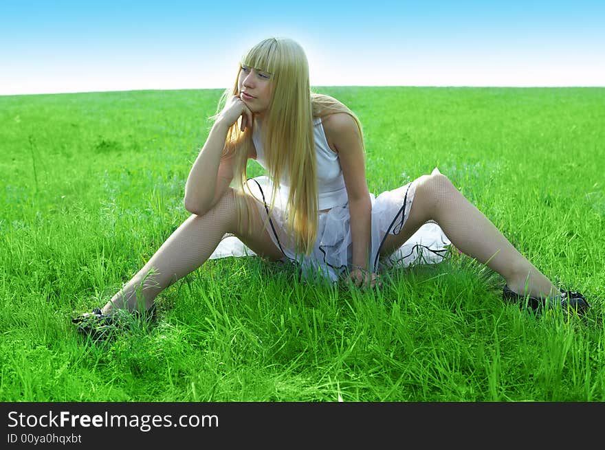 Beauty young woman jump in field