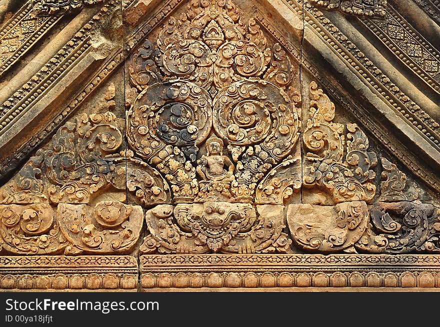 In Cambodia, in Angkor the 10th century temple of Banteay Srey was dedicated to the god Siva. The temple is known as �the jewel of the khmer art�. Here an elaborated carved pediment. In Cambodia, in Angkor the 10th century temple of Banteay Srey was dedicated to the god Siva. The temple is known as �the jewel of the khmer art�. Here an elaborated carved pediment