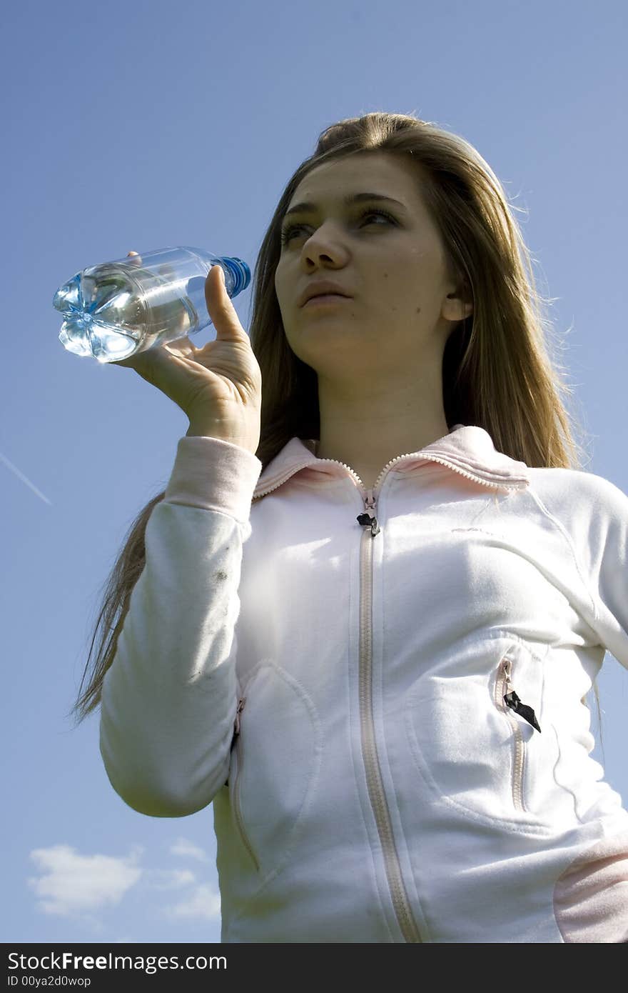 Girl drinking water from bottle