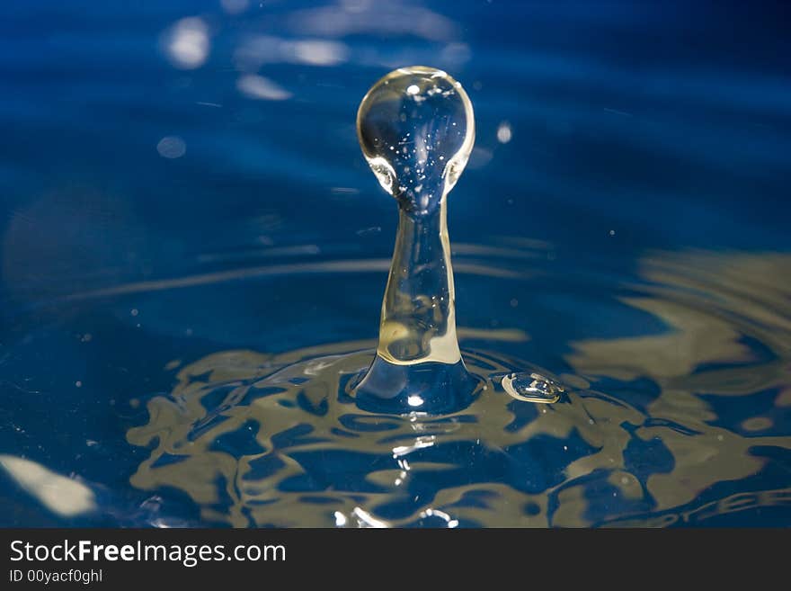 Fantastical water background. Drops, waves, splashes, figure, abstraction