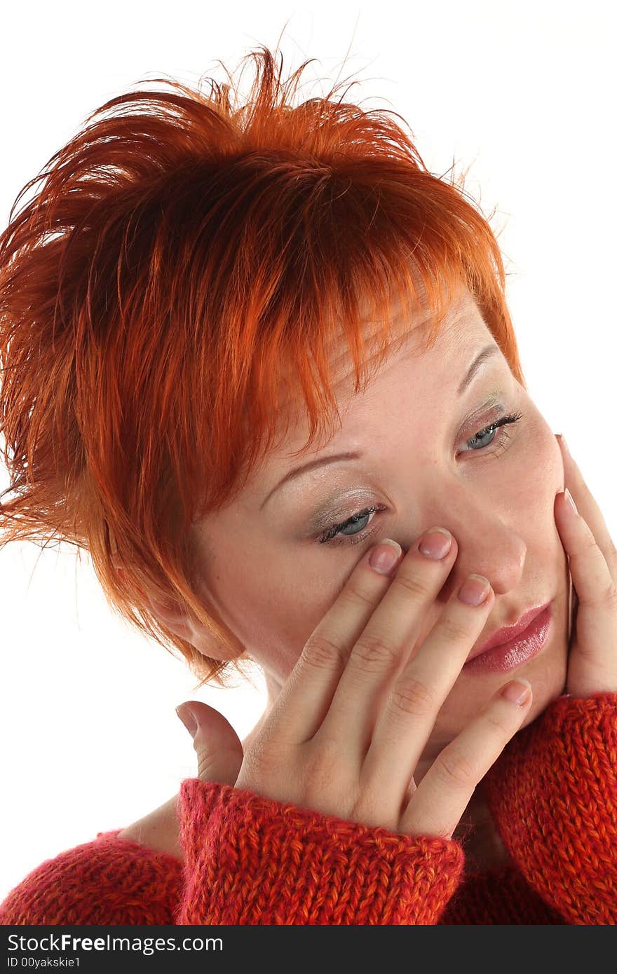 Sad red haired woman isolated on white background