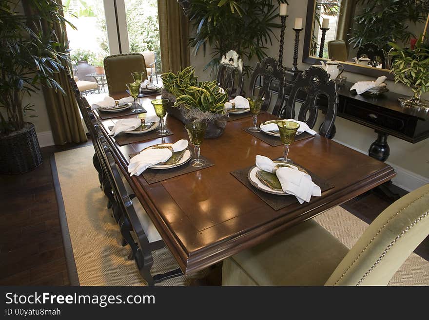 Dining table with modern tableware. Dining table with modern tableware.