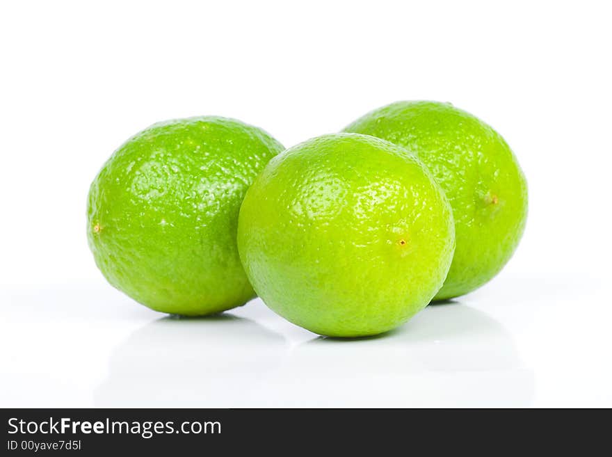 Three green lime on white. Three green lime on white