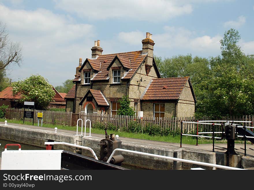 Lock keepers cottage with lock in the foreground.