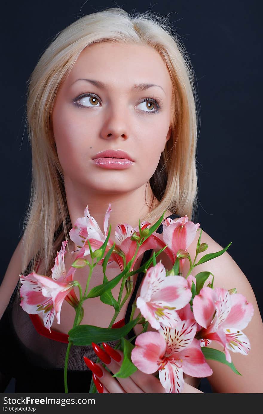 Woman with bunch of flowers