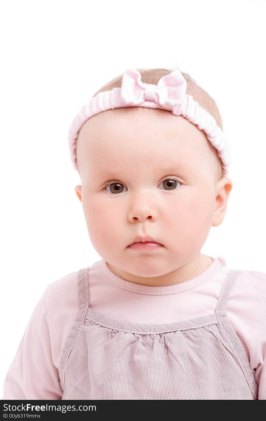 Baby girl with bowknot on head isolated on white background. Baby girl with bowknot on head isolated on white background