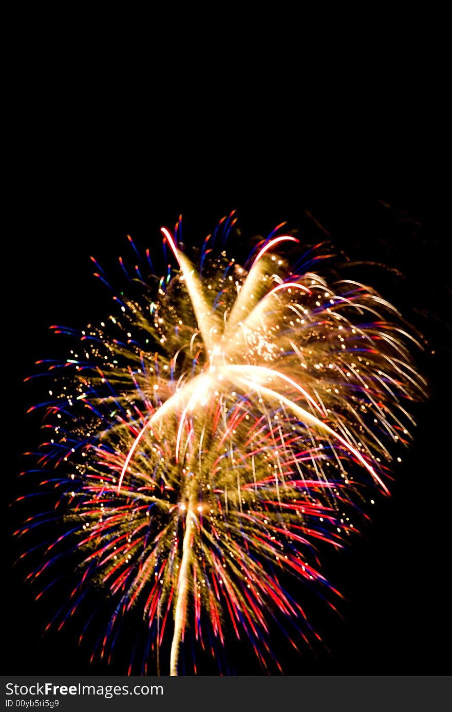 Firework sparkling explosions isolated on black